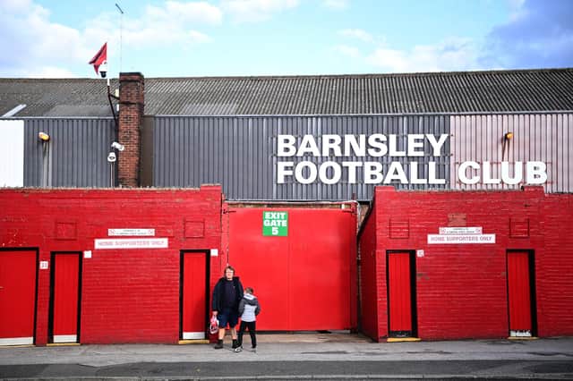 BARNSLEY, ENGLAND - MAY 17: Barnsley fans wait outside the stadium prior to the Sky Bet Championship Play-off Semi Final 1st Leg match between Barnsley and Swansea City at Oakwell Stadium on May 17, 2021 in Barnsley, England.  (Photo by Laurence Griffiths/Getty Images)