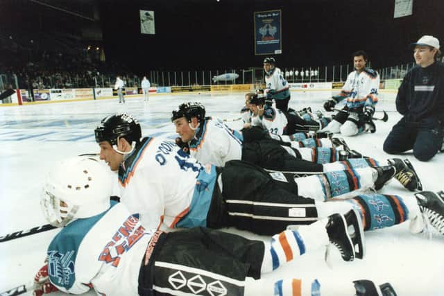 Sheffield Steelers players lying down on the ice - February 27, 1996.