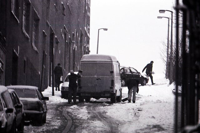 An uphill struggle in the snow in Sheffield city centre in February 1991