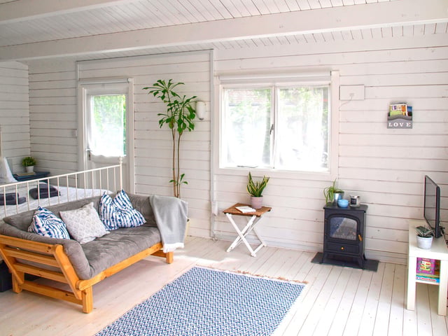 Another view of the cabin's bedroom and living area.
