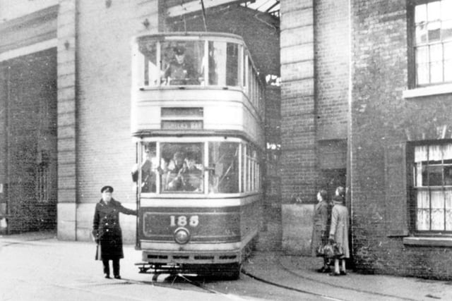 Tram conductor Ivy Walsh with tram no 185 on its way to Hunters Bar, Sheffield, from the Holme Lane Depot in 1942