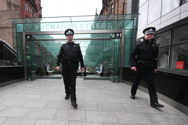 Police on patrol on Buchanan Street in Glasgow on the first day of lockdown. Picture: John Devlin