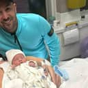 Mollie Dougherty, her baby Tommy, and her partner Tom Dougherty. Mollie had a tumour removed from her jaw just eight hours after giving birth - after being diagnosed with cancer at 37 weeks pregnant.