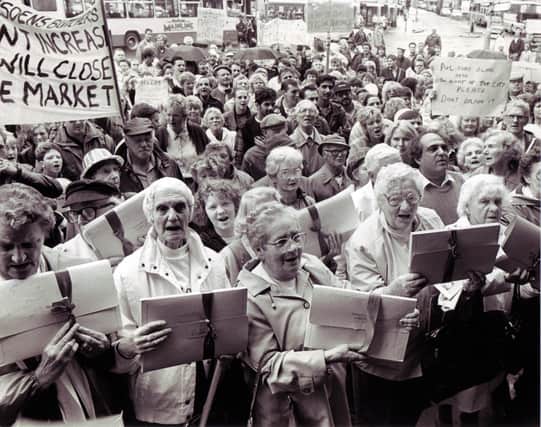 An angry crowd of market traders and pensioners, worried about the threatened closure of Sheffield markets, handing in a multi-thousand petition