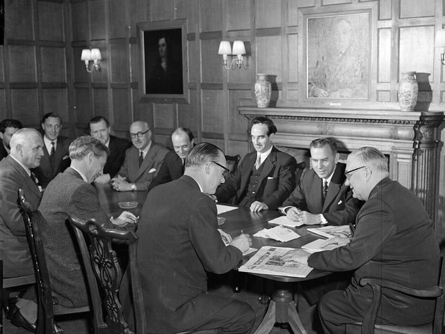 Scotsman proprietor  Roy Thomson meets with editor Alistair Dunnett and staff in The Scotsman boardroom in July 1958.
