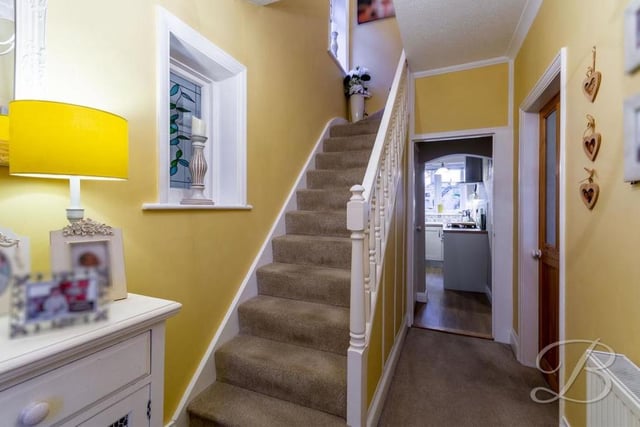 The use of colour in the entrance hallway creates a welcoming atmosphere as soon as you walk in to the Caudwell Drive property. At the far end is the kitchen, but we're now heading up the stairs to check out the bedrooms.
