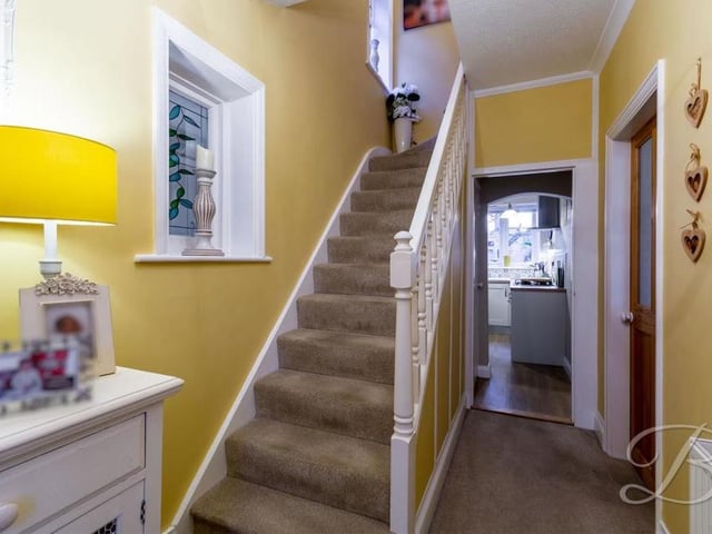 The use of colour in the entrance hallway creates a welcoming atmosphere as soon as you walk in to the Caudwell Drive property. At the far end is the kitchen, but we're now heading up the stairs to check out the bedrooms.