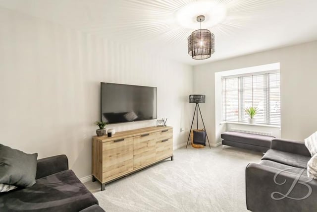 Let's move in to the relaxing living room, which is the ideal place to spend a night in front of the TV. It has a carpeted floor, a central-heating radiator and a window to the front of the property.