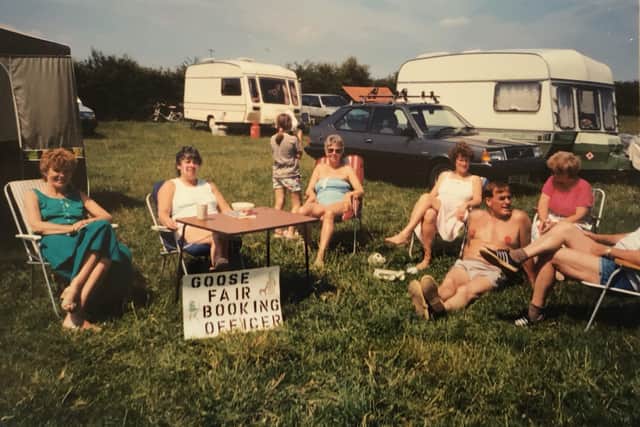 Barbara Betts taking trip bookings with friends at a Camping & Caravanning Club South Yorkshire District Association rally at Ingbirchworth Farm in 1986