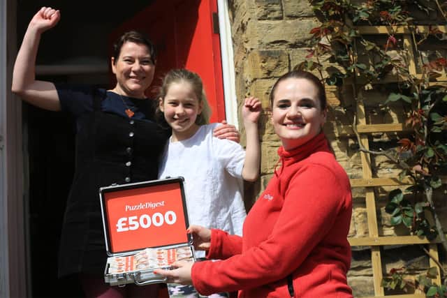 Ranmoor Resident Hannah Read Reaps £5k Cash Success in National Competition. Living with her husband Jon, and children Edith 9, and Stanley 8 Hannah was told of her win via telephone by Puzzle Digest Marketing Manager Clare Haddon pictured, left.
