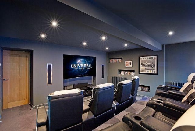 The house boats a beautiful lounge with an adjacent cinema room