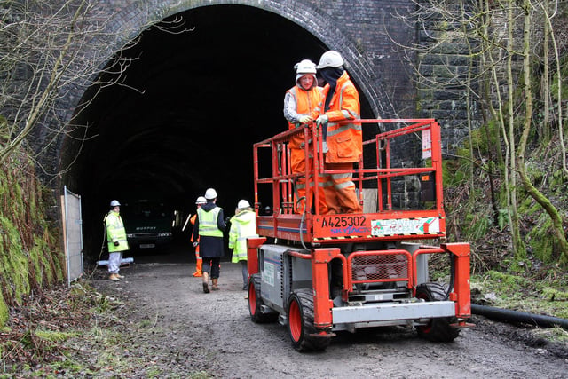 Construction workers pictured at the entrance to one of the tunnels along the Monsal Trail at Miller's Dale in 2009