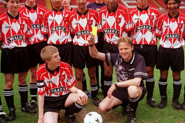 Pictured at Bramall Lane SUFC Ground, where Abbeydale Grange's famed Yll football team are shown the yellow card  by referee Glenn Turner before the start of their game with Notre Dame school. May 1998