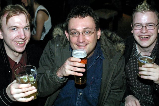 Left to right: Richard Damesin, Tim Robbins and Richard Dixon enjoying a drink at Revolution, Sheffield, in March 2004