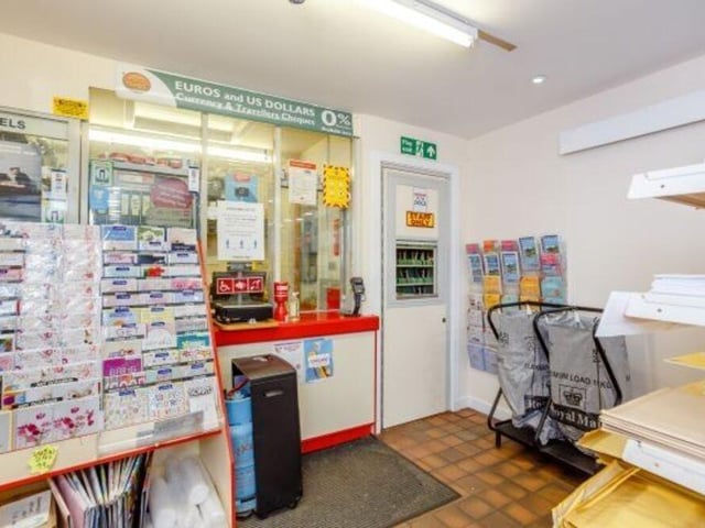 The Post Office operates from a counter at the rear of the shop.