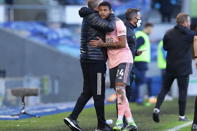 Chris Wilder, pictured hugging Rhian Brewster, wants to bring another centre-half to Sheffield United next month: David Klein/Sportimage
