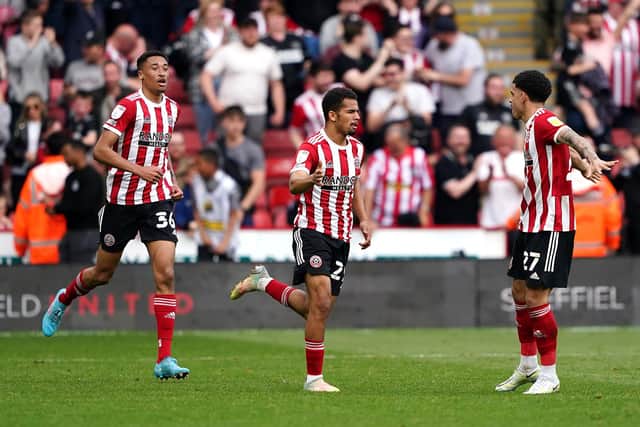 Sheffield United's Iliman Ndiaye (centre) celebrates scoring their side's first goal of the game with his team-mates: Zac Goodwin/PA Wire.