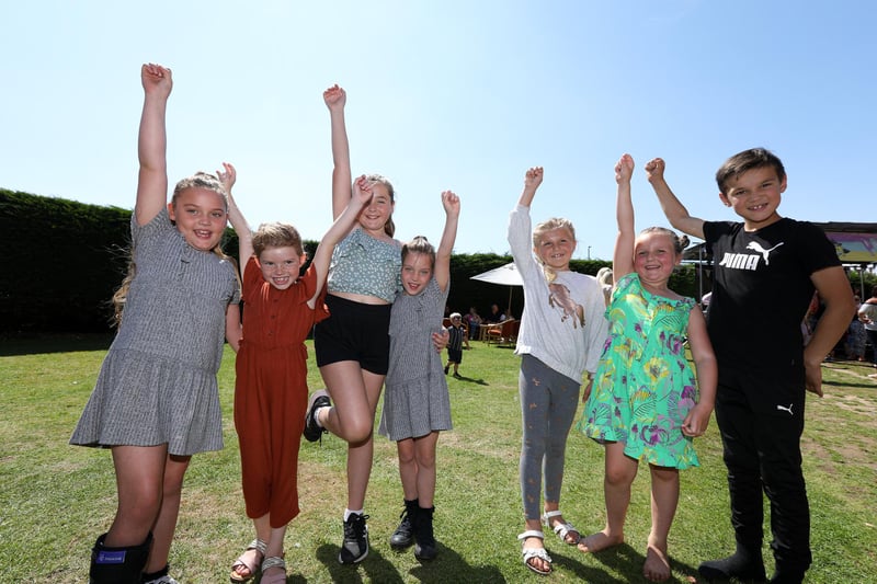 Hands up who is having fun? From left, Penny Foxell, 7, Esme Gooding, 7, Florence Osgood , 9, Poppy Foxell, 7, Coco Rain, 6, Roma Wing, 6, and River Blue, 8.