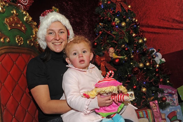 Dani Percival with Teddi Cubbins, two inside Santa's Grotto at the Christmas Market on Fargate. Picture: Andrew Roe