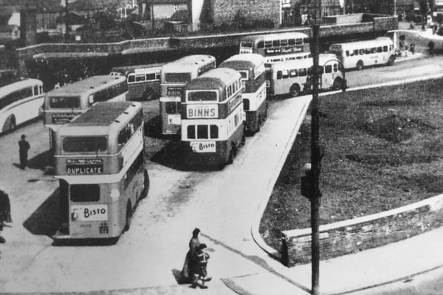Look at how busy the bus station was in the 1950s.