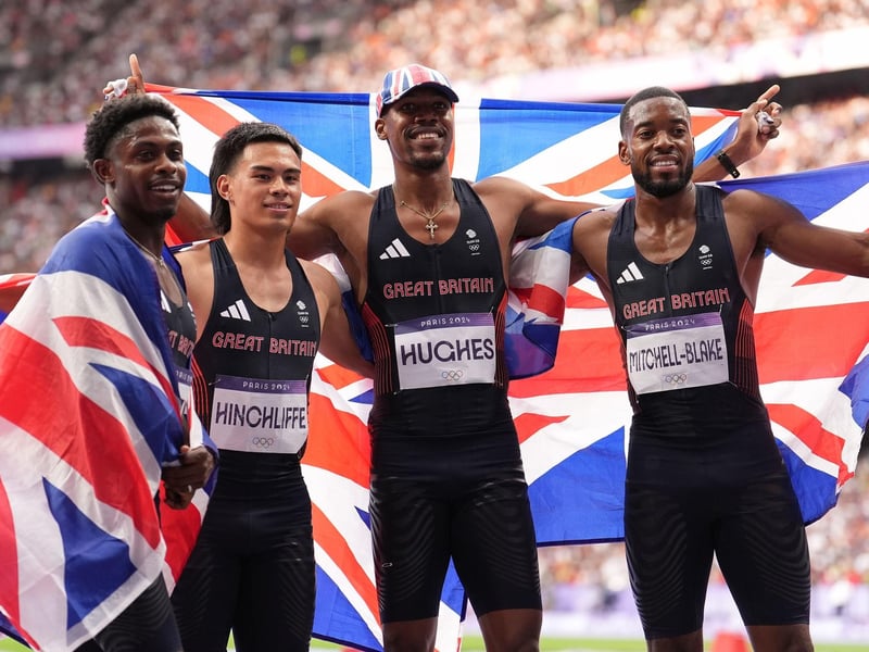 Great Britain's Jeremiah Azu, Louie Hinchliffe, Zharnel Hughes and Nethaneel Mitchell-Blake celebrate winning bronze in the Men's 4 x 100m Relay Final at the Stade de France.
