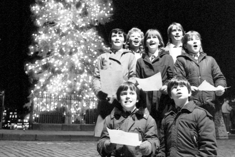 Carrick Knowe primary school singing carols as the Mound's Christmas tree lights were switched on in December 1984.