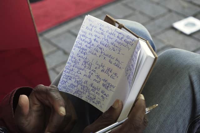 Nathaniel has not let his dreams pass him by and continues to write lyrics in this notepad.