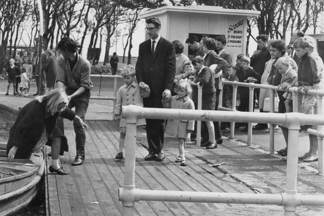 Queues formed early for the scooter boats on the Marine Park Lake in 1965. Remember scenes like these?