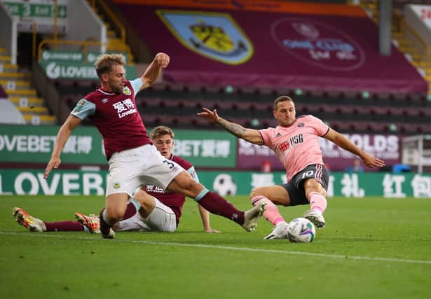 Charlie Taylor of Burnley blocks a shot by Billy Sharp of Sheffield Utd in the last minutes of the game during the Carabao Cup match at Turf Moor, Burnley. Picture date: 17th September 2020. Picture credit should read: Simon Bellis/Sportimage