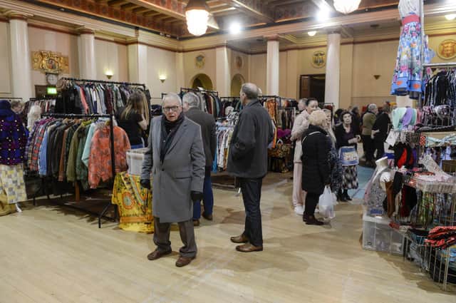 Vintage shoppers looking over the stalls at Sheffield City Hall Ballroom
