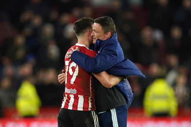 Sheffield United manager Paul Heckingbottom with Jack Robinson	following the Sky Bet Championship match against Blackburn Rovers at Bramall Lane