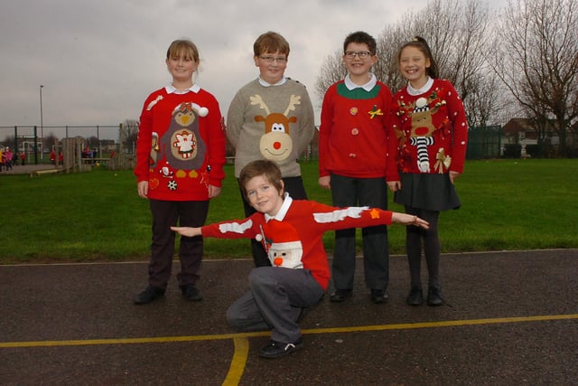 Super smiles from these Holy Trinity School pupils in 2013. Is there someone you know in this photo?