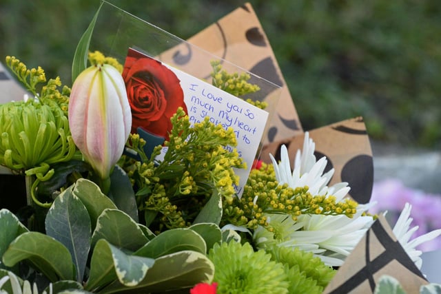 Floral Tributes laid at Wath Road, Mexborough. Picture: NDFP-12-01-21-WathRdTributes 5-NMSY