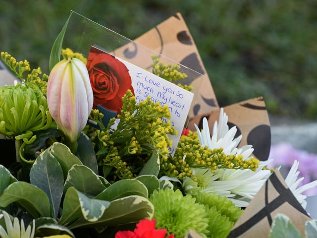 Floral Tributes laid at Wath Road, Mexborough. Picture: NDFP-12-01-21-WathRdTributes 5-NMSY