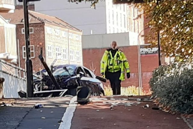 Police investigating the scene of the crash on Moore Street, in Sheffield town centre, which happened in the early hours of the morning