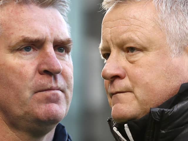 Aston Villa manager Dean Smith (left) and Sheffield United manager Chris Wilder face up on the touchline this evening: Bryn Lennon/Getty Images