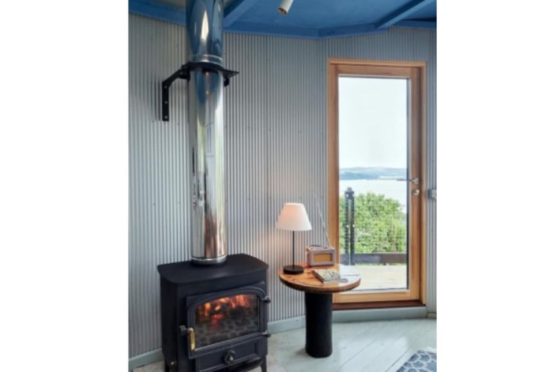 A wood-burner will keep things toasty inside - no matter what the weather.