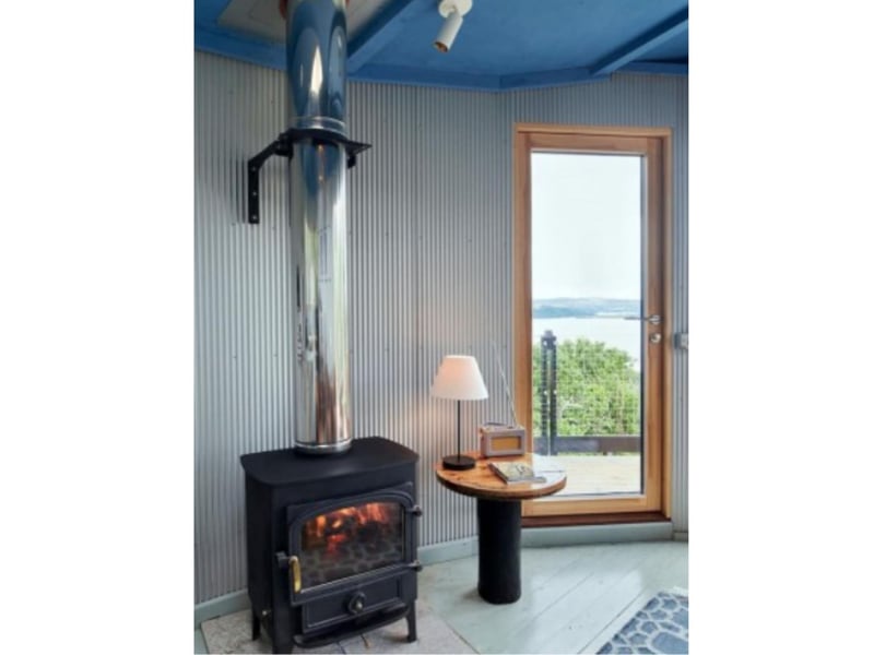 A wood-burner will keep things toasty inside - no matter what the weather.