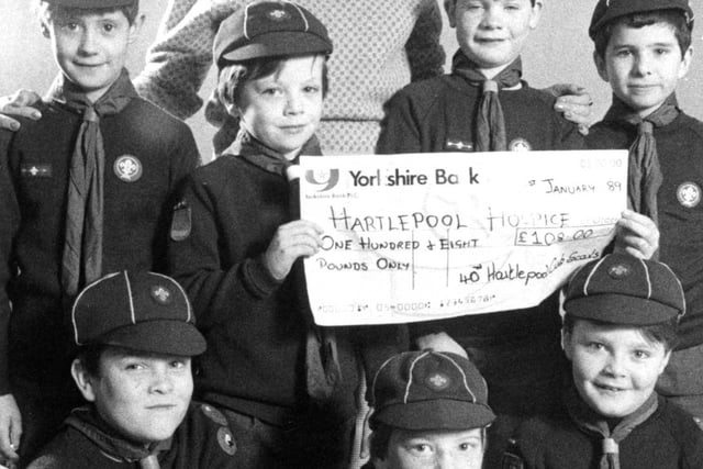 Members of the 40th Hartlepool cub scout pack based at Tunstall Avenue present a cheque to Barbara Cottingham, from the Hartlepool Hospice fundraising committee.  The money had been raised with a sponsored silence. But which year was this?