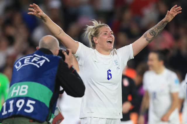 England's defender Millie Bright celebrates after winning with her team at the end of the UEFA Women's Euro 2022 semi-final football match between England and Sweden at Bramall Lane. (Photo by Lindsey Parnaby / AFP)