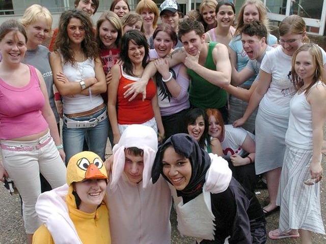 Foreground, left to right: Rebecca Morement as 'the duck', Will Gaunt as 'Babe' and Danielle Golding as 'Fly the Sheepdog' and other members of the cast in the Norton College production of 'Babe the Sheep-Pig', on June 8, 2004