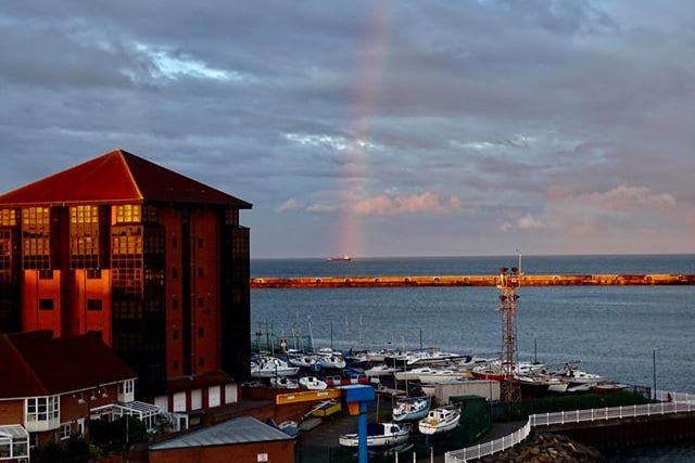 Anna Sheils took this photo over the marina from her home as the rainbow shone through the gloomy and sunlight.