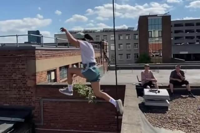 Parkour star Hazal Nehir leaping between rooftops in Sheffield (pic: Lorian Biet)