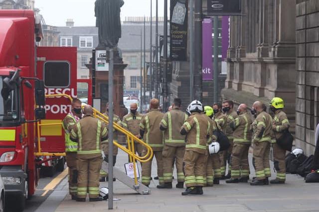Crews wait for further instruction at Chambers Street.