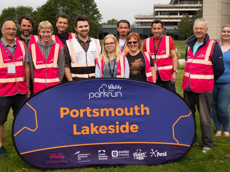 Event director Rob Hall (white bib) and a number of Portsmouth Lakeside volunteers. Picture: Keith Woodland (140821-3)