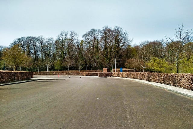 An empty car park at The Alnwick Garden by Geoffrey Bradford.