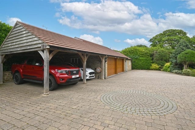 The outbuilding is made up of the carport, a triple garage and a workshop on the end. Plenty of space to be utilised however you see fit.