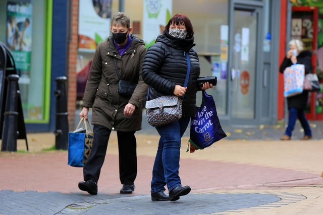 In October, masked shoppers took to the streets of Sutton as tier three lockdown restrictions came in.