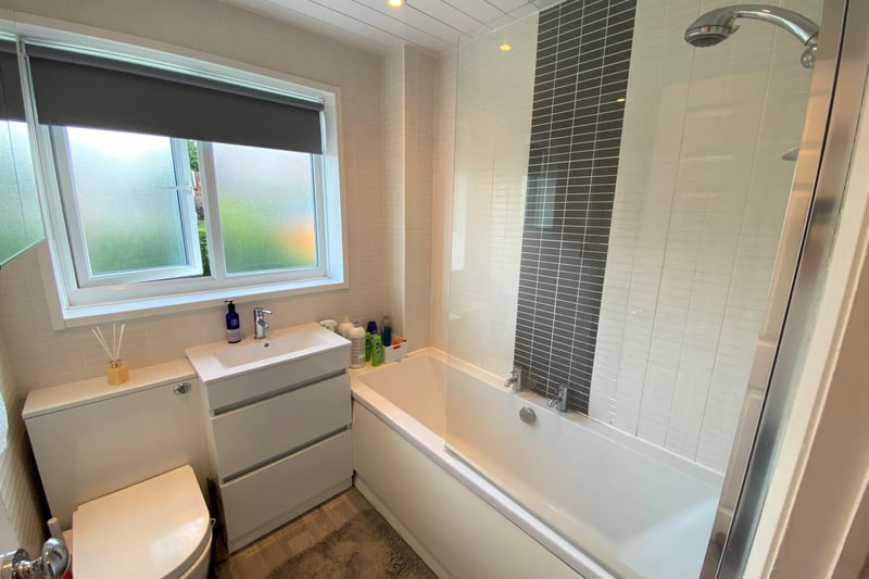 The modern family bathroom has a three piece suite and shower overhead, says the brochure.