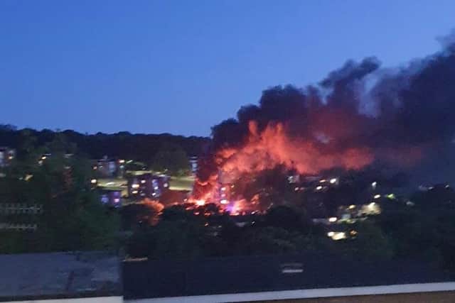 A fire on Overend Drive in Gleadless Valley, Sheffield, sends smoke spiralling into the night sky
